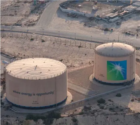  ?? AFP ?? Aramco’s oil assets in Dhahran. Saudi Arabia will extend its voluntary cut of one million bpd to the end of the second quarter