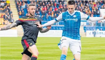  ??  ?? PAST EXPERIENCE: Christie Elliott up against St Johnstone’s Scott Tanser during Partick Thistle’s relegation season of 2017-18.