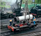  ??  ?? Left: The Mid-Hants Railway's steam crane lifts the boiler from the frames of Peckett 0-4-0ST Kilmersdon at Ropley shed on May 23. JAMES HAMILTON