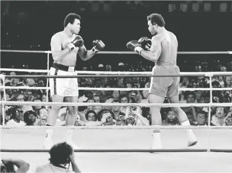  ?? AFP PHOTO/GETTY IMAGES/FILES ?? A total of one billion people watched as Muhammad Ali, left, and George Foreman met in 1974’s Rumble in the Jungle.