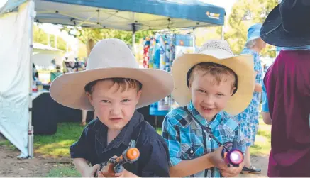 ?? Picture: File ?? GREEN LIGHT: Twins Dominic and Dimitri Bakon at the Warwick Rodeo Country Craft Markets, which have been allowed to operate this year.