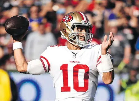  ?? — GETTY IMAGES FILES ?? Quarterbac­k Jimmy Garoppolo led the San Francisco 49ers to victory in their final five games last season, setting himself up to cash in with a five-year, $137.5-million deal.