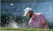  ?? LYNNE SLADKY — THE ASSOCIATED PRESS ?? Charles Kirk hits from a bunker onto the sixth green during the third round of the Honda Classic on Saturday in Palm Beach Gardens, Fla.