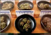  ?? ASSOCIATED PRESS ?? IN THIS JAN. 1 FILE PHOTO, various types of marijuana are on display at Harborside marijuana dispensary in Oakland, Calif.