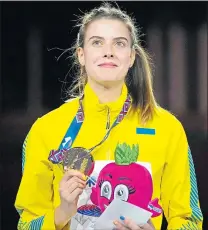  ?? ?? Ukraine’s Yaroslava Mahuchikh claimed gold in the high jump