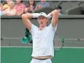  ??  ?? South Africa's Kevin Anderson closes his eyes after winning match point in his singles semifinals match against John Isner of the United States at Wimbledon in London on Friday.