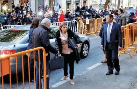  ??  ?? JAVIER BARBANCHO/REUTERS Carme Forcadell, speaker of the Catalan parliament, arrives at Spain’s Supreme Court to testify on charges of rebellion, sedition and misuse of public funds for defying the central government by holding an independen­ce...