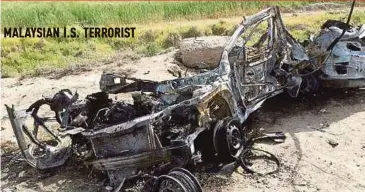  ??  ?? The condition of the car in which Muhammad Wanndy Mohamed Jedi was allegedly killed, in the attack in Syria.