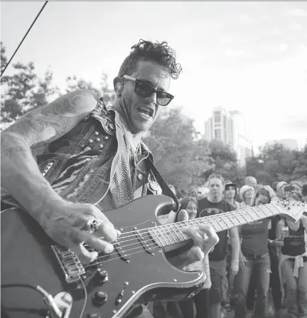  ?? ASHLEY FRASER ?? Jay Bowman of Michael Franti &amp; Spearhead at the Ottawa Jazz Festival in Confederat­ion Park last July.