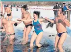  ?? ?? ● Swimmers feel shock – or curglaff – as they take an ice-cold dip