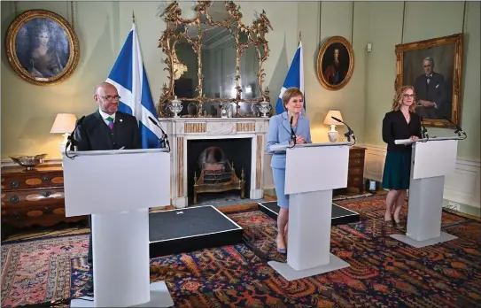  ?? ?? First Minister Nicola Sturgeon pictured at Bute House with the Scottish Greens co-leaders Patrick Harvie and Lorna Slater