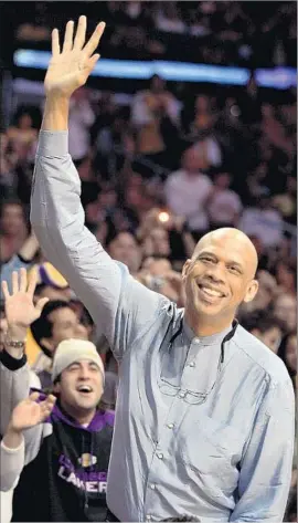  ?? Gary Friedman Los Angeles Times ?? KAREEM ABDUL-JABBAR acknowledg­es the crowd at Staples Center as his 60th birthday is announced in April 2007. He is recovering from bypass surgery.