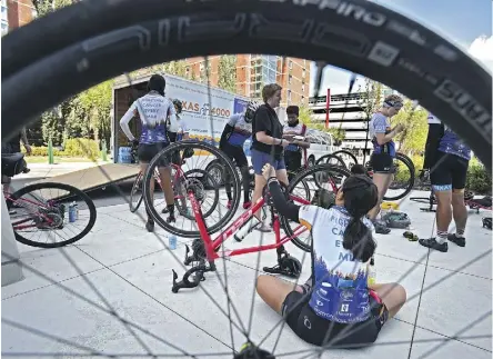  ?? ED KAISER ?? A group of University of Texas students cycling from Austin, Texas to Anchorage, Alaska, stopped at MacEwan University Wednesday during their 4,000-mile charity ride for cancer.