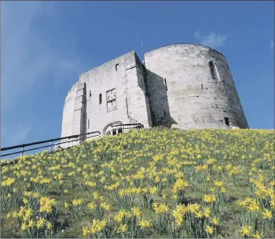  ??  ?? The 13th-century Clifford’s Tower is the last remaining part of York’s Royal castle and is a Roman and Anglican burial ground.