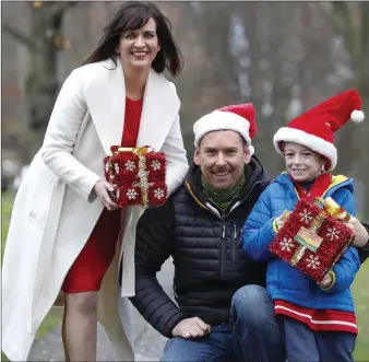  ??  ?? RTE’s Vivienne Traynor, a living kidney donor, stepped out at with kidney transplant recipient Luke Herlihy (age 10), from Sandycove, Dublin and his kidney donor father, Shane (today), at RTE Donnybrook