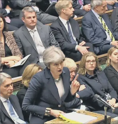  ??  ?? Prime Minister Theresa May answers questions in the House of Commons.