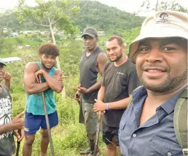  ??  ?? Apisai Moce (right) recently completed his studies from the University of New England, in Armidale, Australia,