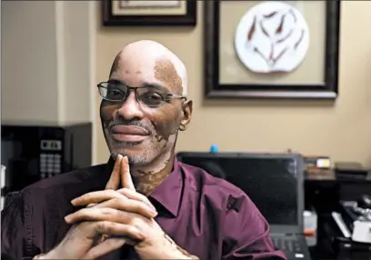  ?? ABEL URIBE/CHICAGO TRIBUNE ?? Andre Joachim Jr. in his counseling office in North Aurora. Joachim, who has a criminal record, has been licensed as a profession­al counselor.