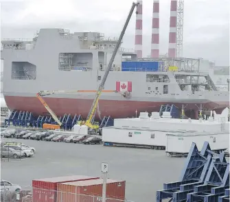  ?? ANDREW VAUGHN, THE CANADIAN PRESS ?? Two of the three mega-blocks of the future Canadian naval ship HMCS Harry DeWolf are on the docks of the Halifax Shipyard.