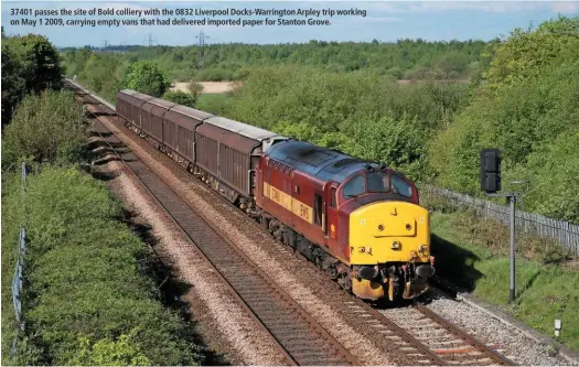  ??  ?? 37401 passes the site of Bold colliery with the 0832 Liverpool Docks-Warrington Arpley trip working on May 1 2009, carrying empty vans that had delivered imported paper for Stanton Grove.