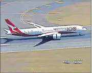  ?? [AUSTRALIA POOL VIA THE ASSOCIATED PRESS] ?? In this image made from video, a Qantas Boeing 787 Dreamliner plane lands Friday at the airport in Sydney.