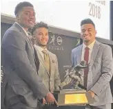  ?? AP ?? Heisman finalists Dwayne Haskins of Ohio State (from left), Kyler Murray of Oklahoma and Tua Tagovailoa of Alabama pose with the trophy Friday.