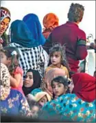  ?? DELIL SOULEIMAN/AFP ?? Syrian civilians flee amid aerial bombings along the Turkish border on Wednesday.