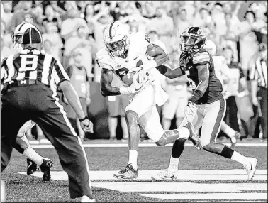  ?? Jeffrey Becker USA Today ?? Penn State wide receiver Juwan Johnson catches the game-winning touchdown pass as Iowa defensive back Manny Rugamba tries to defend as time expires in the fourth-ranked Nittany Lions’ 21-19 victory Saturday night in Iowa City, Iowa.