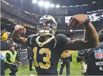  ?? BILL FEIG/THE ASSOCIATED PRESS ?? New Orleans Saints wide receiver Michael Thomas flexes for fans after Sunday’s 36-21 win over the Carolina Panthers in New Orleans.