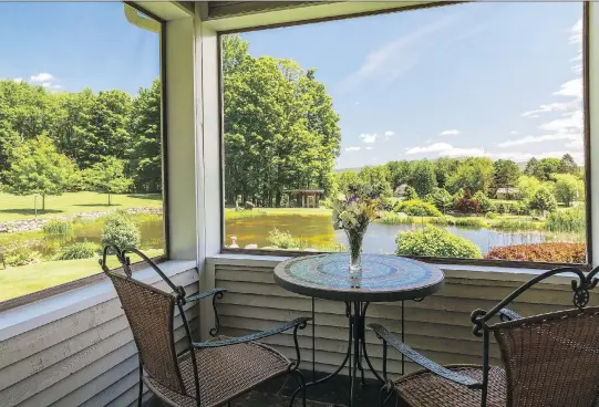  ?? PHOTOS: PERRY MASTROVITO ?? A beautiful view of the main pond can be had from the sunroom where Mike Stone and Susan Wallet like to eat their breakfast.