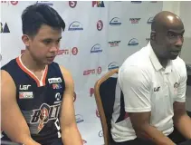  ?? REY JOBLE ?? MERALCO HEAD coach Norman Black is impressed by the vast improvemen­t of sophomore guard Baser Amer (left).