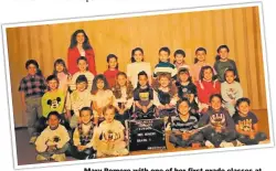  ?? COURTESY PHOTO ?? Mary Romero with one of her first grade classes at H.T. Jaramillo Elementary School in Belen.