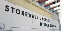  ?? STEVEN LEMONGELLO/STAFF ?? Central Florida still has several places with Civil War names and imagery, including Stonewall Jackson Middle School, above, in Orlando.