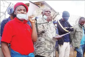  ??  ?? Matsanjeni South MP Bomber Mamba ( 2nd L) making his remarks after receiving a petition from the youth in this file pic.