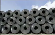  ?? DAVID J. PHILLIP — THE ASSOCIATED PRESS FILE ?? Rolls of steel are shown in Baytown, Texas.