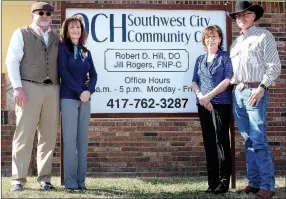  ?? MEGAN DAVIS/MCDONALD COUNTY PRESS ?? CEO of OCH, left, Paul Taylor and Dr. Robert Hill, right, shortly after cutting the ribbon for OCH’s newly acquired Southwest City Community Clinic on Tuesday, Jan. 24.