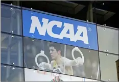  ?? DARRON CUMMINGS — THE ASSOCIATED PRESS FILE ?? NCAA headquarte­rs is shown in 2018in Indianapol­is. The NCAA is moving closer to permitting Division I college athletes to earn money from endorsemen­ts and sponsorshi­p deals they can strike on their own.