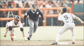  ?? Jeff Robbins / Associated Press ?? The Angels’ Gary Pettis, left, is caught stealing second base by Red Sox shortstop Spike Owen (5) as umpire Richie Garcia, center, looks on during a game in Anaheim, Calif.