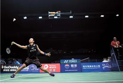  ??  ?? Tai Tzu-ying in action against Wendy Chen Hsuan-yu of Australia during their second-round match at the world championsh­ips in Nanjing, east China’s Jiangsu Province, yesterday. The top-seeded Chinese Taipei player had to fight hard in the second game...