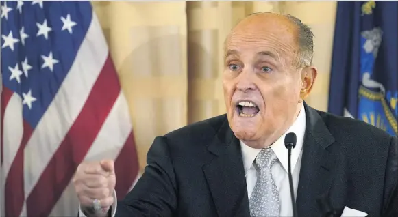  ?? KATHY WILLENS/AP ?? The New York Post says it received a copy of a hard drive containing the emails from Trump lawyer Rudy Giuliani.
