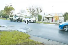  ??  ?? Residents say crossing points - “kerb outstands” - in Albert St do nothing to help pedestrian­s get across the busy roads or improve safety and Baw Baw shire should instead have installed “proper pedestrian crossings”.