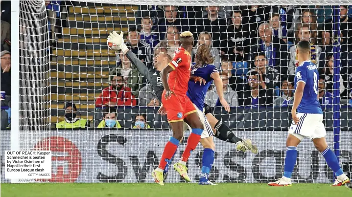  ?? GETTY IMAGES ?? OUT OF REACH: Kasper Schmeichel is beaten by Victor Osimhen of Napoli in their first Europa League clash