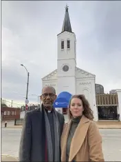  ?? JIM SALTER — THE ASSOCIATED PRESS ?? The Rev. Darryl Gray and the Rev. Lauren Bennett stand in front of Bennett’s church, Metropolit­an Community Church of Greater St. Louis, on Jan. 10 in St. Louis, Mo.