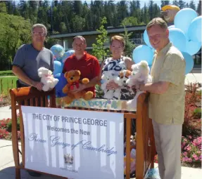  ?? CITIZEN FILE PHOTO ?? City of Prince George councillor­s Lyn Hall, Cameron Stolz, Mayor Shari Green and Coun. Murry Krause sent best wishes to the new royal infant Prince George of Cambridge in July 2013.