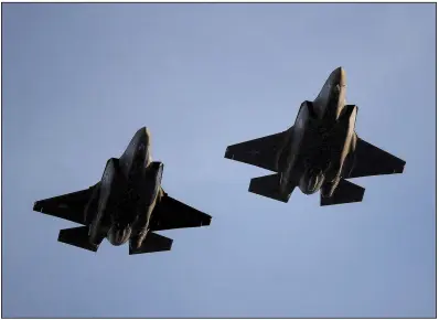  ?? AP file photo ?? Air Force F-35A fighter jets fly over Levi’s Stadium in Santa Clara, Calif., in November before the start of a National Football League game. United Technologi­es makes engines for Lockheed Martin’s F-35s.