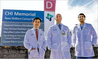  ?? COURTESY OF OLIVIA ROSS ?? Doctors Tru-khang Dinh, Justin Wilkes and Rishabh Shah of CHI Memorial’s Rees Skillern Cancer Institute in Chattanoog­a, Tennessee, gather on Friday. Five months ago, they removed a rare tumor from Maurice “Sonny” Swanson, who is recovering.