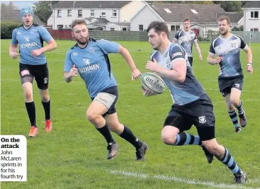  ??  ?? On the attack John McLaren sprints in for his fourth try