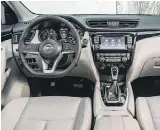  ??  ?? The Qashqai’s dashboard is a near copy of the Rogue’s, right down to the gauges, switches, touchscree­n and vent outlets.