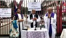  ?? ?? Father Albert Alejo (left) and Father Flavie Villanueva (center) celebrate Mass for the victims of deadly anti-drug crackdown during the rule of former President Rodrigo Duterte. (UCAN)