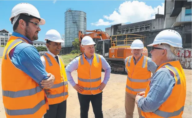  ??  ?? GROUNDBREA­KING PROJECT: LDI Constructi­ons project engineer Glenn Jones, World Class Global sales director Zak Thaker, Queensland Treasurer Curtis Pitt, Kelly Developmen­ts director Paul Kelly and Cr Terry James. Below, an artist’s impression of the...